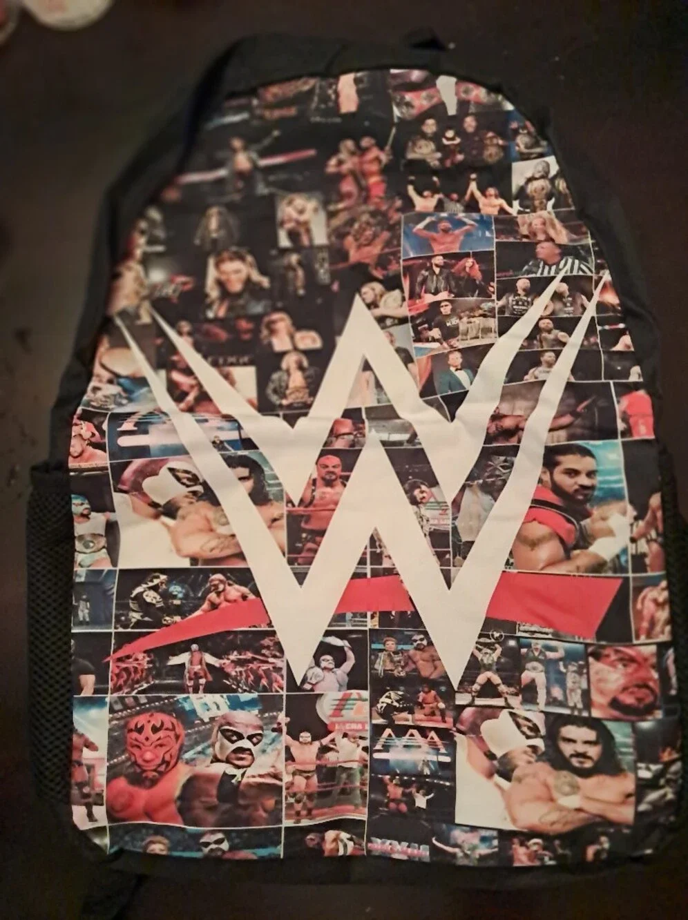 WWE Black Multi-Image Logo Kids Backpack with White W Emblem